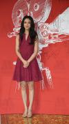 Actress Tang Wei wearing Burberry London split neckline lace dress at the 21st B